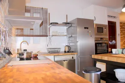 Una cocina o zona de cocina en Muro Center