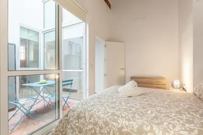 Cama o camas de una habitación en Pasaje de amores der Descanso en casa y vida cultural y monumentos 2px