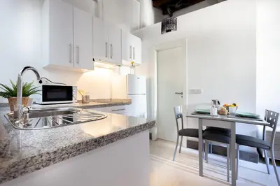 Una cocina o zona de cocina en Pasaje de amores der Descanso en casa y vida cultural y monumentos 2px