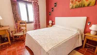 Cama o camas de una habitación en Hacienda El Corchuelo