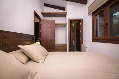 Cama o camas de una habitación en Casa Rural con skatepark y piscina 