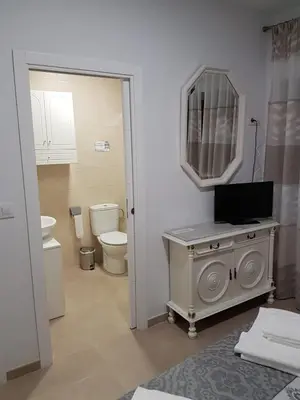 Un baño de Apartamentos HELA