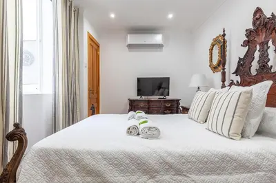 Cama o camas de una habitación en CASA DE LA LUZ -Elegante Casco Antiguo 5-Hab