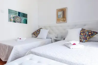 Cama o camas de una habitación en CASA DE LA LUZ -Elegante Casco Antiguo 5-Hab