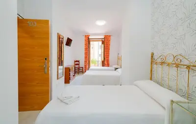 Cama o camas de una habitación en Hotel Manzanito