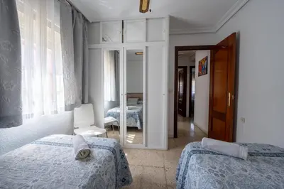 Cama o camas de una habitación en Sevilla Sol