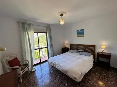 Cama o camas de una habitación en Casa El Chorro con magníficas vistas