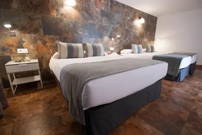 Cama o camas de una habitación en Hospedería Los Angeles