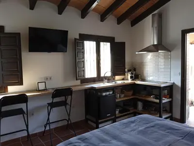 Cama o camas de una habitación en Finca Las Hierbas B&B