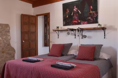 Cama o camas de una habitación en Appartement El Balcon ( cortijo La Cubertilla)
