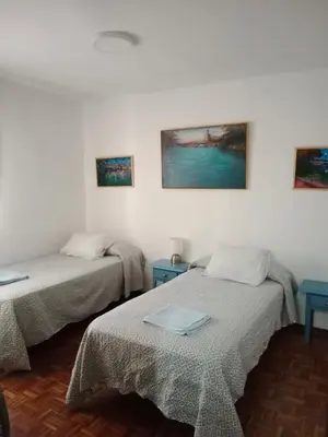 Cama o camas de una habitación en Apartamento zona Palacio de las Dueñas y las Setas