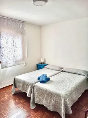 Cama o camas de una habitación en Apartamento zona Palacio de las Dueñas y las Setas