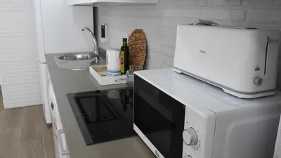 Una cocina o zona de cocina en Viviendas con Fines Turisticos ``La Jamuga´´