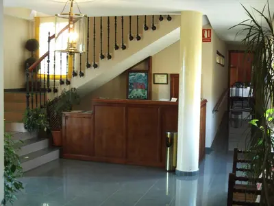El vestíbulo o zona de recepción de Hostal San Luis