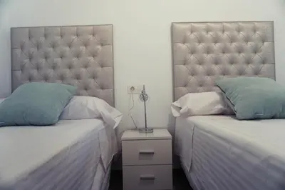 Cama o camas de una habitación en Apartamentos Ondeanos