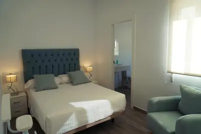 Cama o camas de una habitación en Apartamentos Ondeanos