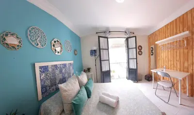 Zona de estar de Budget and cute rooms with balcony Sevilla center