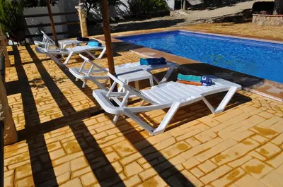 Piscina en o cerca de Cortijo Rural Las Nogueras