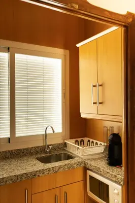 Una cocina o zona de cocina en Alojamiento Turístico Fuente del Rey