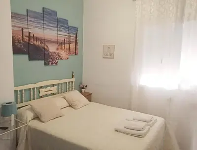 Cama o camas de una habitación en Apartamento San Juan de Dios