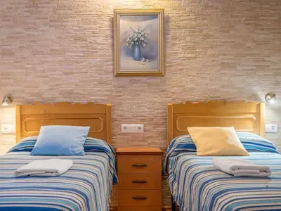 Cama o camas de una habitación en Holiday Home Rural Cacin by Interhome