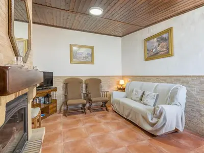 Una televisión o centro de entretenimiento en Holiday Home Rural Cacin by Interhome