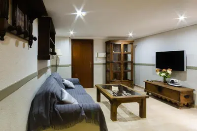 Una televisión o centro de entretenimiento en Geysotur Porta Novas Home