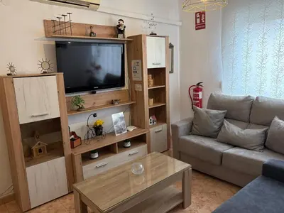 Una televisión o centro de entretenimiento en CASA DE ANA