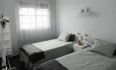 Cama o camas de una habitación en La Casa de Maribel