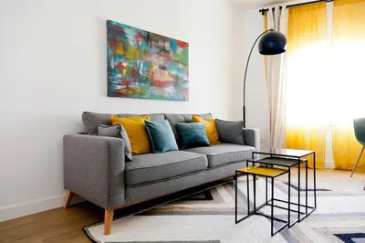 Zona de estar de GoToSeville GERONA SUITES