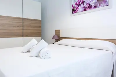 Cama o camas de una habitación en Geysotur Columbus Home