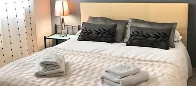 Cama o camas de una habitación en VENUS DE BAEZA SUITE