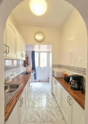 Una cocina o zona de cocina en Enjoy Sevilla Familia