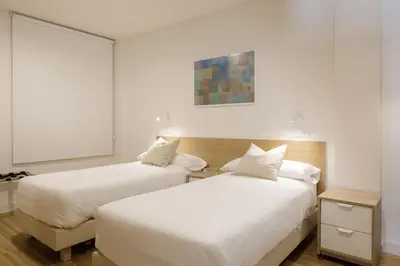 Cama o camas de una habitación en Mush Room Apartamentos
