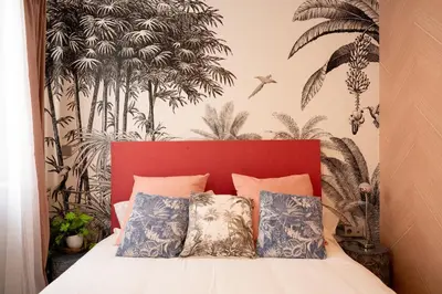 Cama o camas de una habitación en GoToSeville ALTAIR SUITES