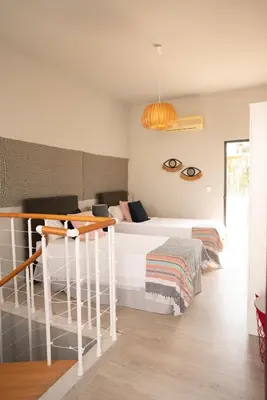 Cama o camas de una habitación en GoToSeville ALTAIR SUITES