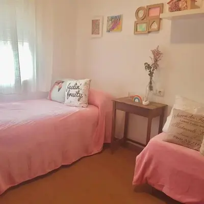 Cama o camas de una habitación en Casa con piscina de agua salada Villa Pepucho 1