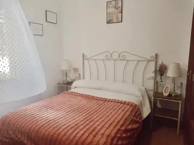 Cama o camas de una habitación en Casa con piscina de agua salada Villa Pepucho 1