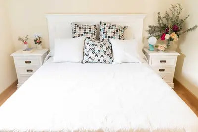 Cama o camas de una habitación en Casa con piscina de agua salada Villa Pepucho 2