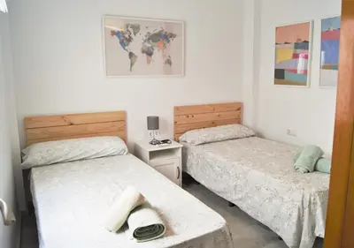 Cama o camas de una habitación en Reformado Coqueto Fleming a 5 minutos Mezquita WIFI AIRE POSIBILIDAD PARKING