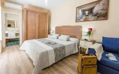 Cama o camas de una habitación en CASA LOS LAGARES