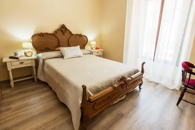 Cama o camas de una habitación en CASA LOS LAGARES