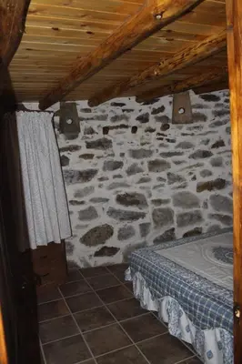 Cama o camas de una habitación en Alojamiento Los Chozos