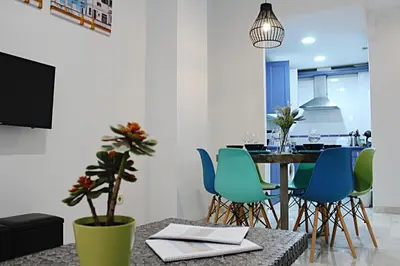 Una televisión o centro de entretenimiento en WISH SUITE SAN LUIS DE SEVILLA