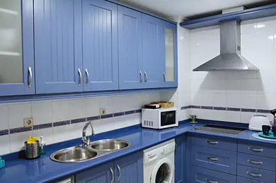 Una cocina o zona de cocina en WISH SUITE SAN LUIS DE SEVILLA
