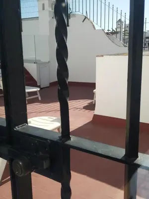 Un balcón o terraza de WISH SUITE JUDERIA DE SEVILLA