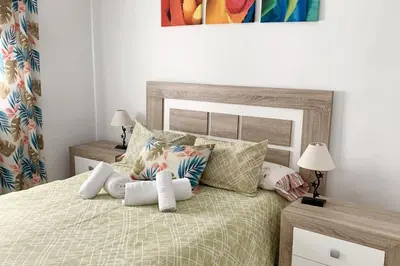 Cama o camas de una habitación en Charming city centre apartment in Córdoba with parking
