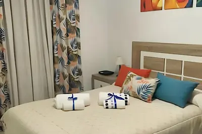 Cama o camas de una habitación en Charming city centre apartment in Córdoba with parking