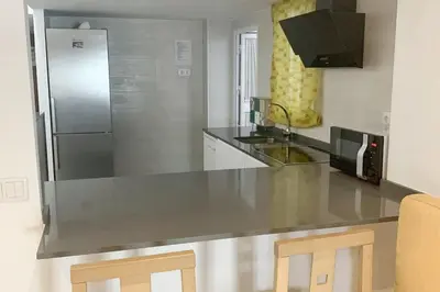 Una cocina o zona de cocina en Charming city centre apartment in Córdoba with parking
