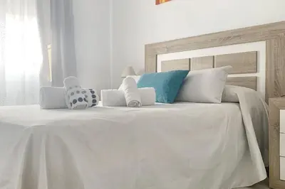 Cama o camas de una habitación en Charming city centre apartment in Córdoba with parking